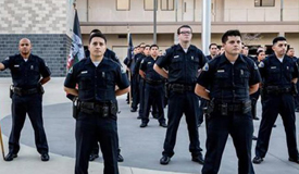 Policemen standing in a crime scene